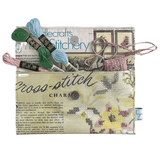 Vintage 1950's magazine wallet with cross stitch charm and PVC cover, handmade and lined with embroidery kit ad.