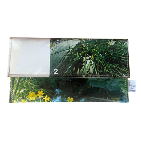 Floral-patterned wallet with a white border on a white background