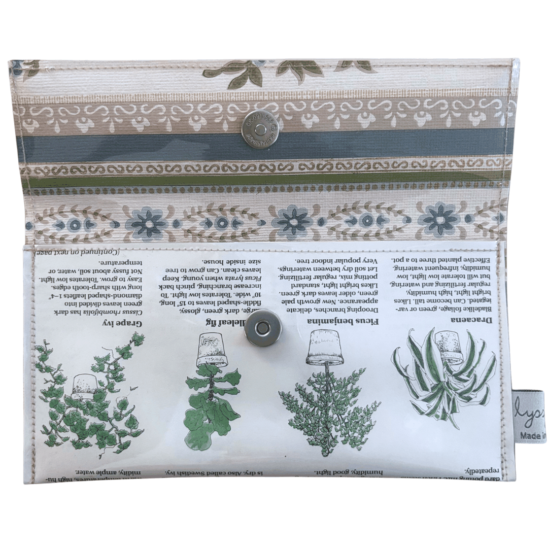 Lyssy May handmade wallet featuring pages from a vintage gardening book. Inside wallpaper lining with magnetic clip closure.