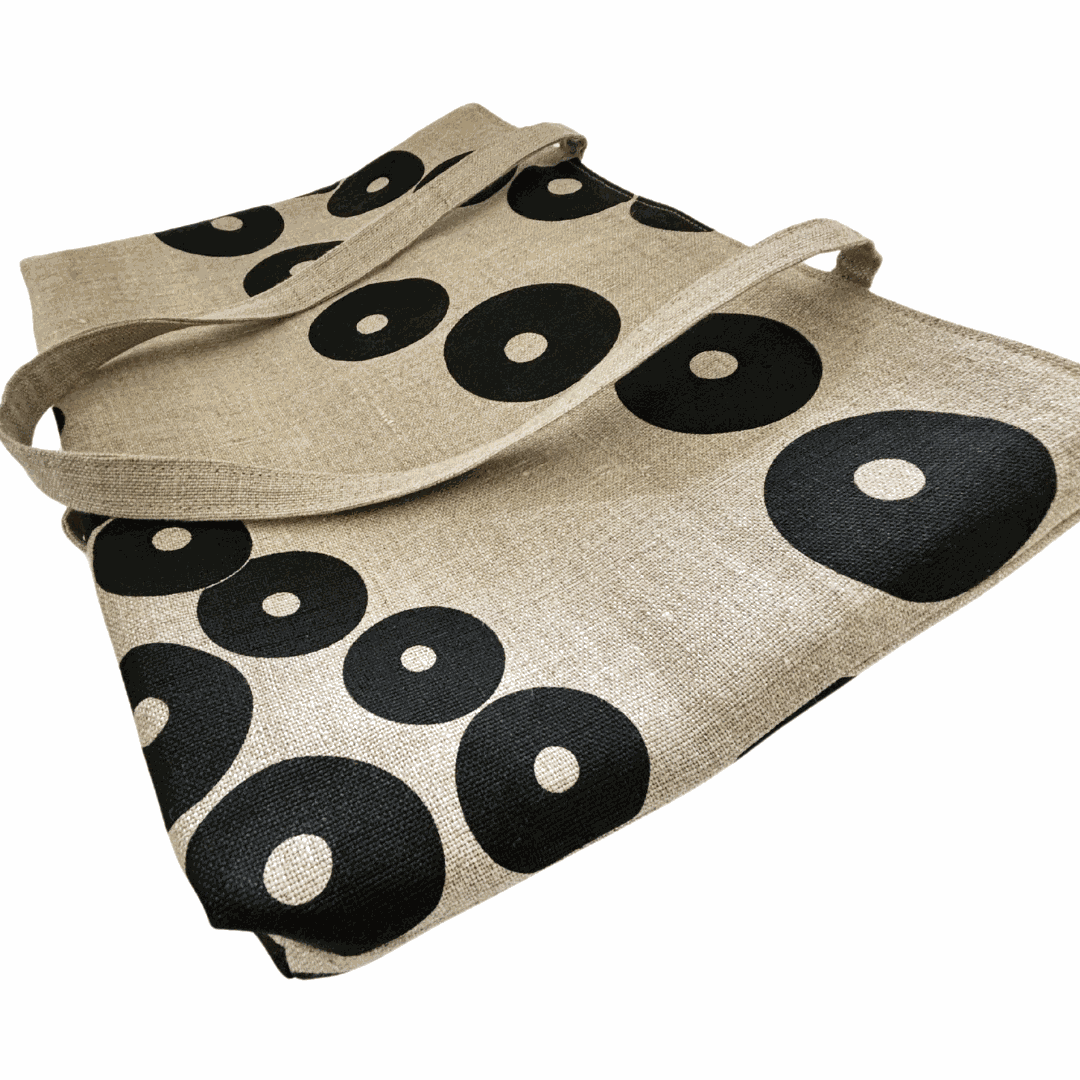 Organic Linen tote bag with black circular pattern on a white background