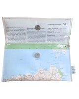 Back view of handmade wallet featuring Tasmania by Lyssy May with a clear plastic cover and metal buttons on a white background lined with information page