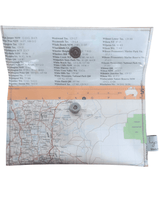 Map-themed wallet with text and a map design on a white background