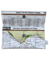 Lyssy May wallet using map of Central Northern Victoria with a clear plastic cover displaying text and a map of Australia. Magnetic clip closure. Inside view with index to Victorian towns lining.