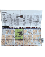 Inside view of  handmade wallet by Lyssy May with map design featuring text and branding on a white background