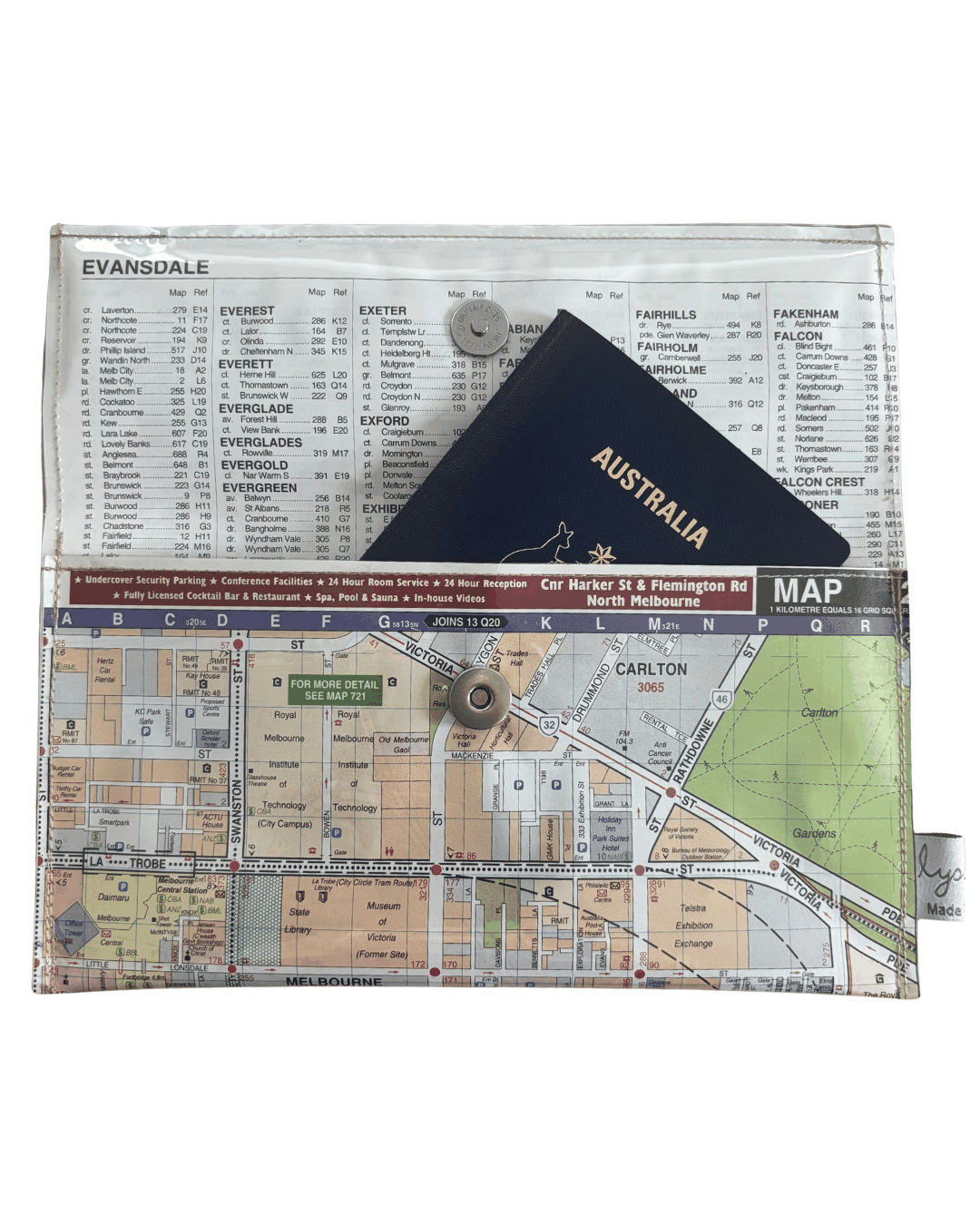 Inside view of handmade map wallet featuring Melbourne by Lyssy May Australia that is lined with an index page and closes with magnetic clip. A passport fits in the wallet
