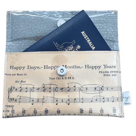 Vintage sheet music wallet made from 1940s "Happy Days, Happy Months, Happy Years" song page with protective PVC and magnetic clasp