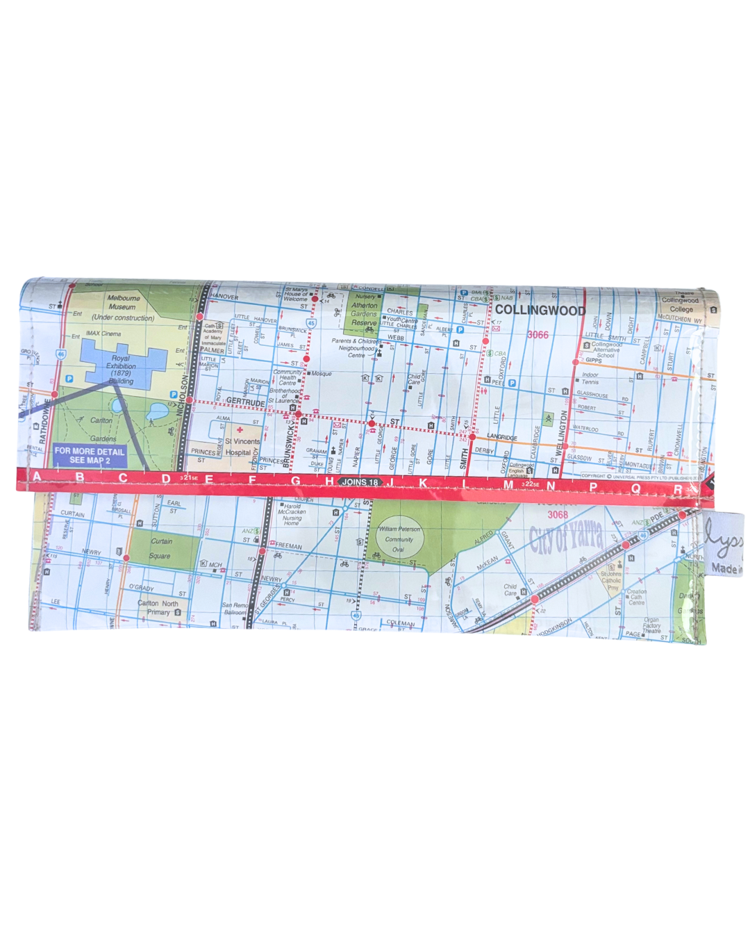 Map-patterned handmade wallet on a white background