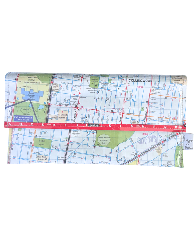 Map-patterned handmade wallet on a white background